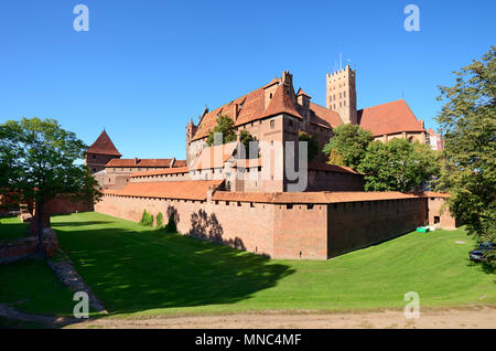 The 13th century Malbork Castle, founded by the Knights of the Teutonic Order, a Unesco World Heritage Site. Marienburg (Mary's Castle). Pomerania, Po Stock Photo