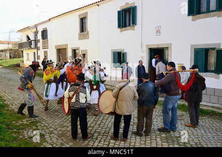 A folk group (Pauliteiros de Miranda) that practice an ancient warrior Iberian dance. Traditional Winter festivities in Constantim. Tras-os-Montes, Po Stock Photo