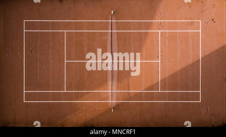 Abandoned tennis court. Aerial Shot. Stock Photo