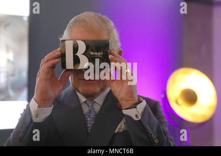 The Prince of Wales looks through a virtual viewer during a visit to the YouTube Space London in Kings Cross as part of a whirlwind tour of innovative businesses in the capital. Stock Photo