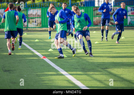 MINSK, BELARUS - MAY 14, 2018: Soccer playes training before the Belarusian Premier League football match between FC Dynamo Minsk and FC Luch at the Olimpiyskiy stadium. Stock Photo