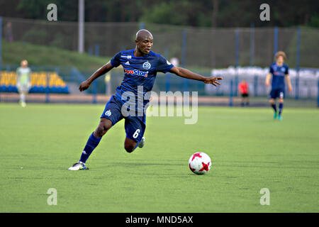 MINSK, BELARUS - MAY 14, 2018: Soccer player YAHAYA SEIDU kick the ball during the Belarusian Premier League football match between FC Dynamo Minsk and FC Luch at the Olimpiyskiy stadium. Stock Photo