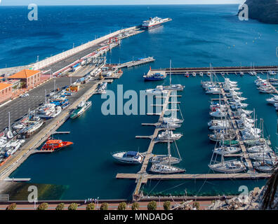 The harbour ferry port and marina at San Sebastian on the island of La Gomera in the Canary Islands Stock Photo