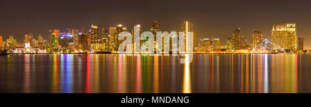 San Diego Skyline at Night - A panoramic night view of west side of San Diego Downtown Skyline by the North San Diego Bay, San Diego, California, USA. Stock Photo
