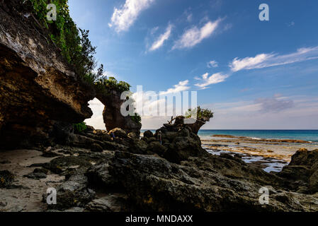 Natural rock bridge at Neil island during low tide, in the Andaman and Nicobar archipelago, India Stock Photo