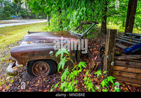 rusting vintage car taken on Pacific Highway, Palmdale, NSW, Australia on 8 January 2018 Stock Photo