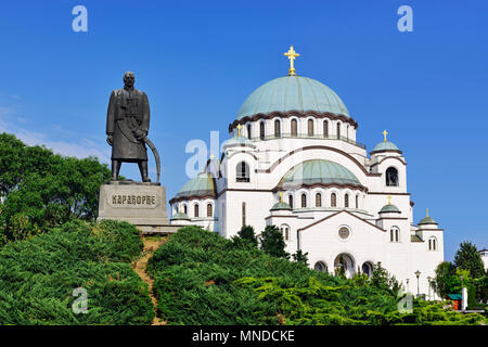 Belgrade, Serbia, Monument to Karadjordje with the Church of Saint Sava in the background. Stock Photo
