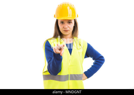 I'm watching you concept with young attractive female architect or engineer as inspector supervisor gesture isolated on white background Stock Photo