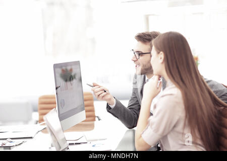 Two managers in a business meeting analyzing data Stock Photo
