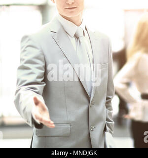 The businessman, hand for handshake. The conclusion of the transaction. Stock Photo