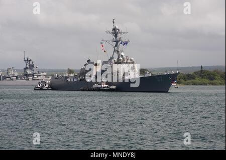 PEARL HARBOR- (May 14, 2018) The Arleigh Burke-class guided-missile destroyer USS Halsey (DDG 97) returned to its homeport, Joint Base Pearl Harbor-Hickam, May 14, after a seven-month deployment to the U.S. 5th and 7th Fleet areas of operations, May 14, 2018. Halsey departed Pearl Harbor Oct. 16 to join the Theodore Roosevelt Carrier Strike Group (TRCSG). (Photo by Aviation Electrician Technician Airman Joshua Markwith). () Stock Photo