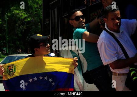 Valencia, Carabobo, Venezuela. 16th May, 2018. May 16, 2018. Students accompanied by civil society protested in the shantytown of Guaparo, against the presidential elections. They called not to vote in what they describe as an electoral fraud where they will not be elected because of the kidnapping of Venezuela's electoral system and would be endorsing an illegitimate government. In Valencia, Carabobo state. Photo: Juan Carlos Hernandez Credit: Juan Carlos Hernandez/ZUMA Wire/Alamy Live News Stock Photo