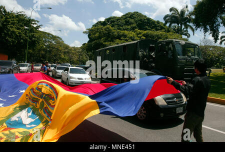 Valencia, Carabobo, Venezuela. 16th May, 2018. May 16, 2018. Students accompanied by civil society protested in the shantytown of Guaparo, against the presidential elections. They called not to vote in what they describe as an electoral fraud where they will not be elected because of the kidnapping of Venezuela's electoral system and would be endorsing an illegitimate government. In Valencia, Carabobo state. Photo: Juan Carlos Hernandez Credit: Juan Carlos Hernandez/ZUMA Wire/Alamy Live News Stock Photo