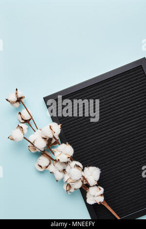 Black letterboard with space for text on cyan background. Blank letter board with copy space. Stock Photo