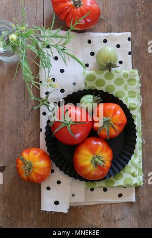 An arrangement of fresh garden tomatoes Stock Photo