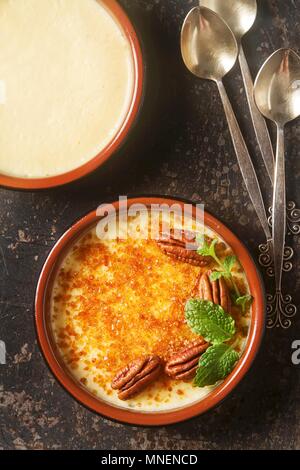 Creme caramel with pecans and mint Stock Photo