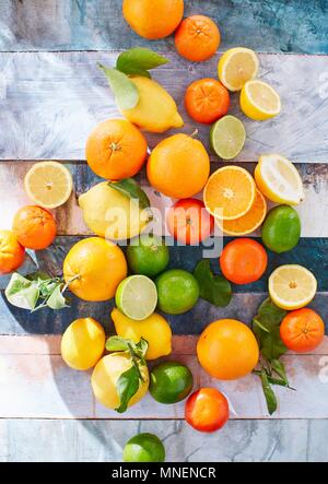 Citrus fruits, whole and sliced Stock Photo