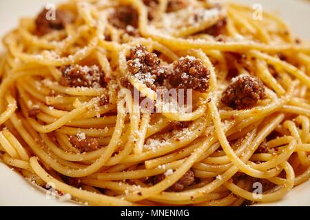 Spaghetti with a minced meat sauce and Parmesan (close-up) Stock Photo