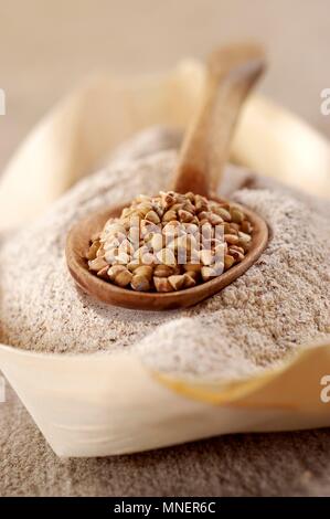 Buckwheat grains and buckwheat flour Stock Photo