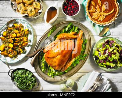 Thanksgiving roast turkey with sides (seen from above) Stock Photo