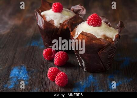 Blueberry muffins and fresh berries Stock Photo