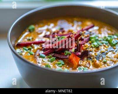 Vegetable soup with beetroot and herbs Stock Photo