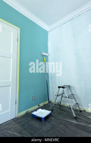 Painting tools on wall background Stock Photo