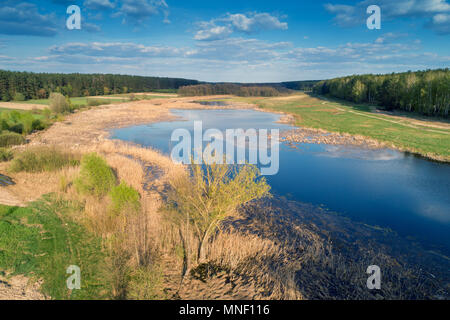 Aerial view of valley with river in early spring. Rural landscape. Wild nature. Gradient artistic color Stock Photo