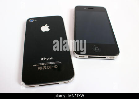 Iphone 4 and i-phone four s, twins smartphone, editorial Stock Photo