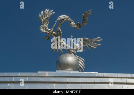 Storks on Arc of Good Hopes and Wishes, Independence Square, Tashkent, Uzbekistan Stock Photo