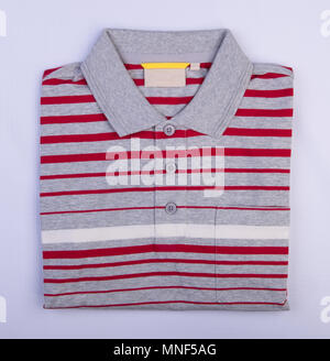 shirt or mens folded polo shirt on background Stock Photo