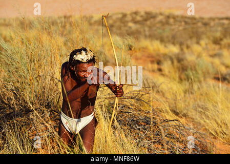 Bushman of the San people hunting, !Xaus Lodge, Kalahari or Kglagadi Transfrontier Park, Northern Cape, South Africa Stock Photo