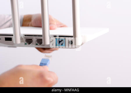 The back view of router showing the lan internet port, and the land ...