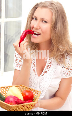 beautiful young woman with fruits and vegetables Stock Photo