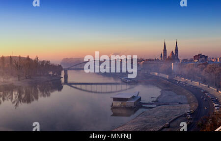Szeged, Hungary panorama at down. With Votive Church visible in the back and Tisza river in winter Stock Photo
