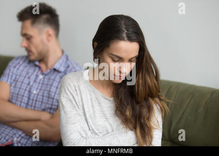 Concerned wife being sad about family problems Stock Photo