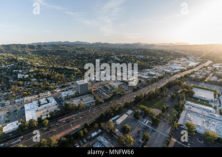 Los Angeles, California, USA - April 18, 2018:  Late afternoon aerial view of Ventura 101 Freeway and Ventura Blvd in the Woodland Hills area of LA. Stock Photo