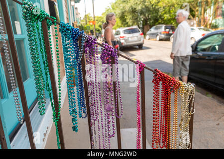 New Orleans, Louisiana - Mardi Gras beads on a house in the Bywater neighborhood. Stock Photo