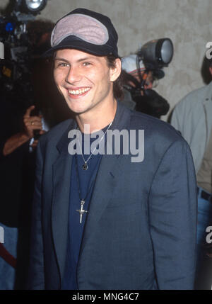 WESTWOOD, CA - SEPTEMBER 17: Actor Christian Slater attends the 'Goodfellas' Westwood Premiere on September 17, 1990 at Mann Bruin Theatre in Westwood, California. Photo by Barry King/Alamy Stock Photo Stock Photo