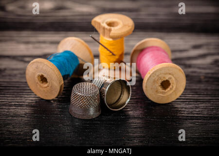 Black Thread with a Needle and Spool of Thread Stock Image - Image of  design, clothing: 114053879