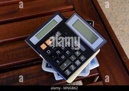 Calculators gathering dust. Stock Photo