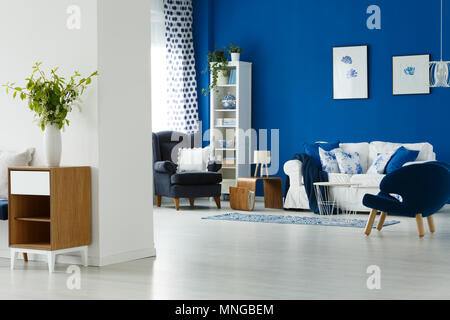 Cozy blue and white living room interior Stock Photo