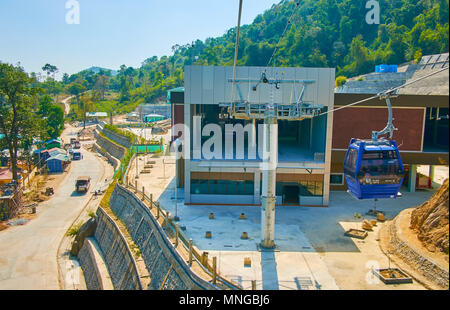 KYAIKTIYO, MYANMAR - FEBRUARY 16, 2018: The first cableway  between Yathetaung and Kyaiktiyo Pagoda is the proud of Myanmar, it boasts modern stations Stock Photo