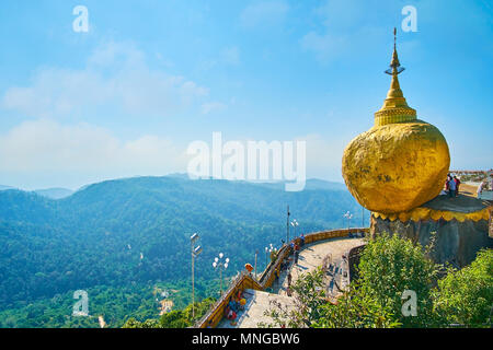 KYAIKTIYO, MYANMAR - FEBRUARY 16, 2018: Panorama of outstanding Buddhist  Kyaiktiyo Pagoda with scenic mountain landscape on the background, on Februa Stock Photo