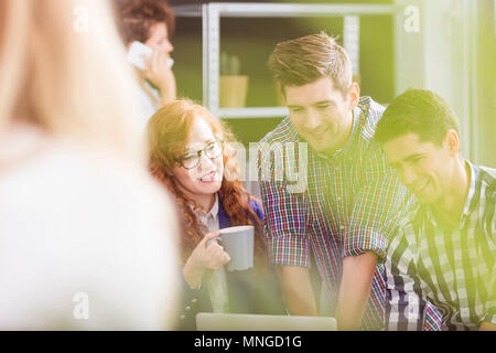 Team of young and creative co-workers having a brainstorming Stock Photo