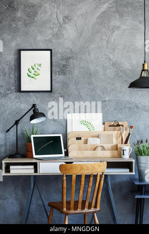 Retro desk of an illustrator with laptop and vintage decor Stock Photo