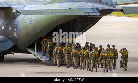 EINDHOVEN, THE NETHERLANDS - SEP 17, 2016: Paratroopers entering a German Air Force C-160 Transall military airplane. Stock Photo