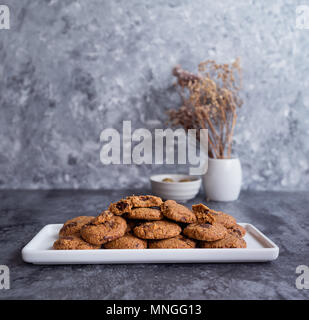 Hazelnut Cookies on a plate, table setting. Stock Photo