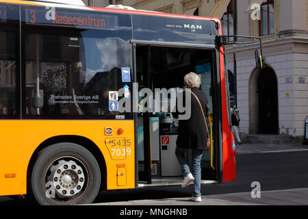 Linkoping, Sweden - August 21, 2017: One person boarding the bus in service on line 3 in downtown. Stock Photo