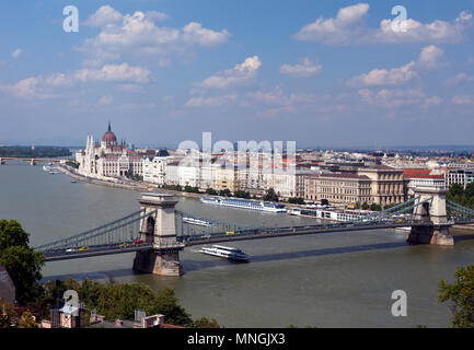 Budapest's famous Chain Bridge and the Hungarian Parliament building, as seen from the terrace of the Royal Palace on Buda Hill. Stock Photo